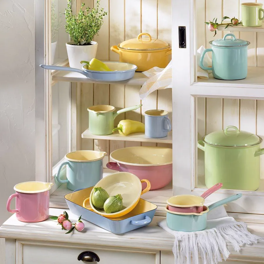 Pastel enamelware displayed on a kitchen dresser